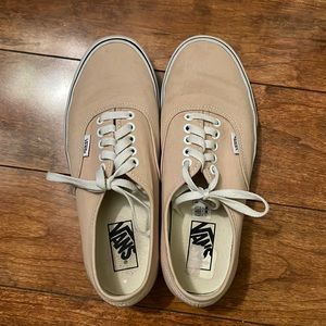These are flat salmon colored Vans. Size 9, white shoe laces.